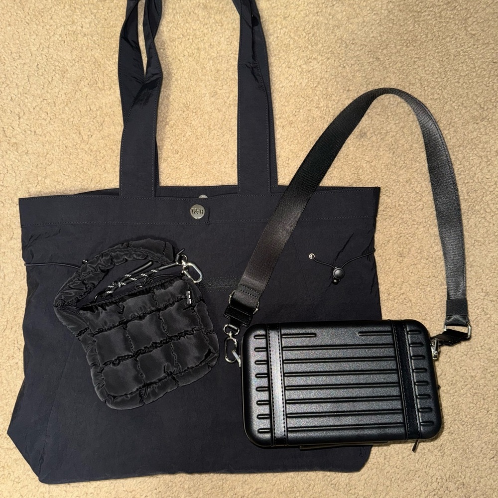 I&R black tote era bag and puff cutie